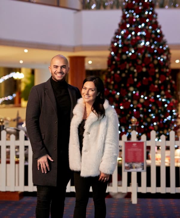 Christmas Couple Resort Lobby