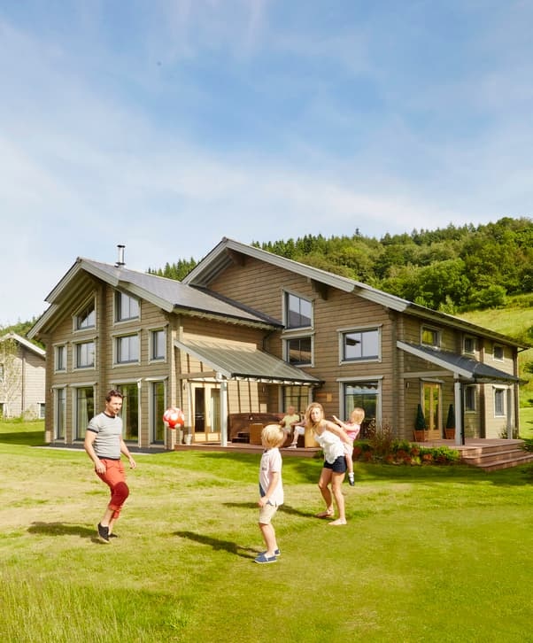 Family Outside Hunter Lodge