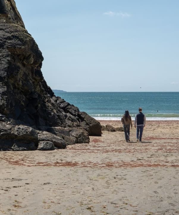 Couple Walking on Beach